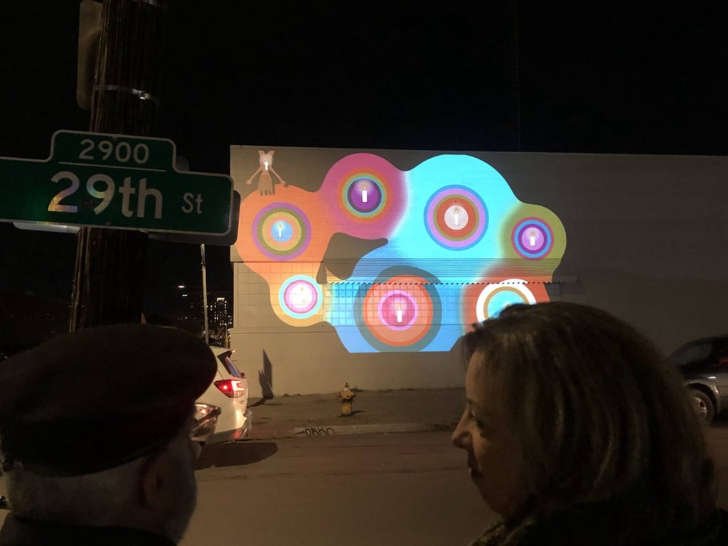 Don't miss a sunset in RiNo this week: As the sky darkens, five bare building exteriors will be illuminated with the unique work of five local artists, unified by a theme of love. Side Stories is back.